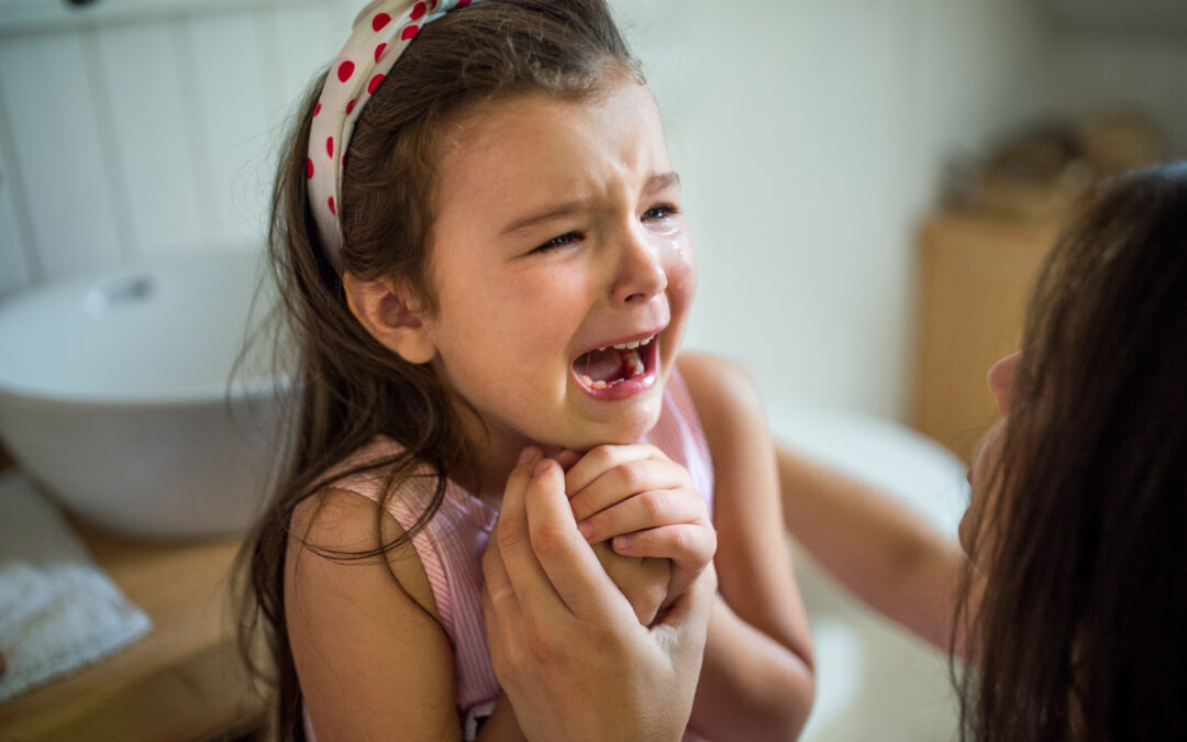 What to Do if My Kid Has a Dental Emergency During the Holiday Season in Lawrence?