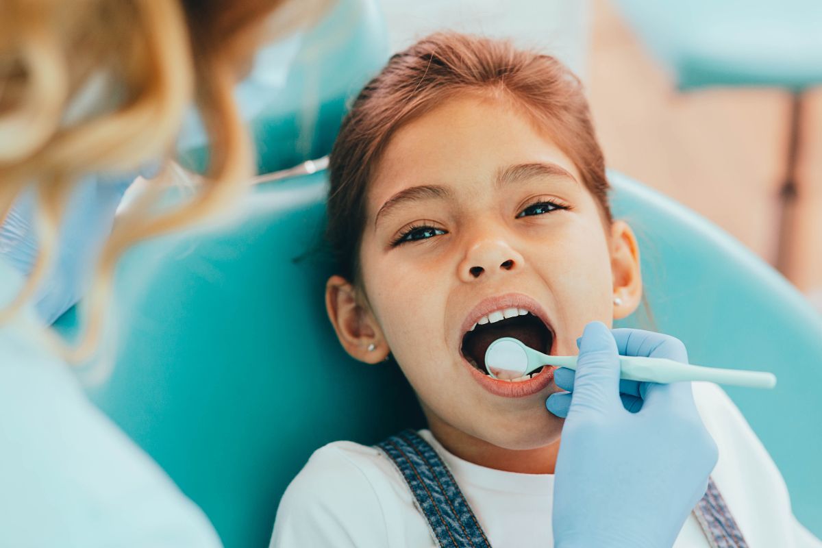 child-dental-checkup-lawrence-ny Child receiving a routine dental checkup at a pediatric dental office in Lawrence, NY
